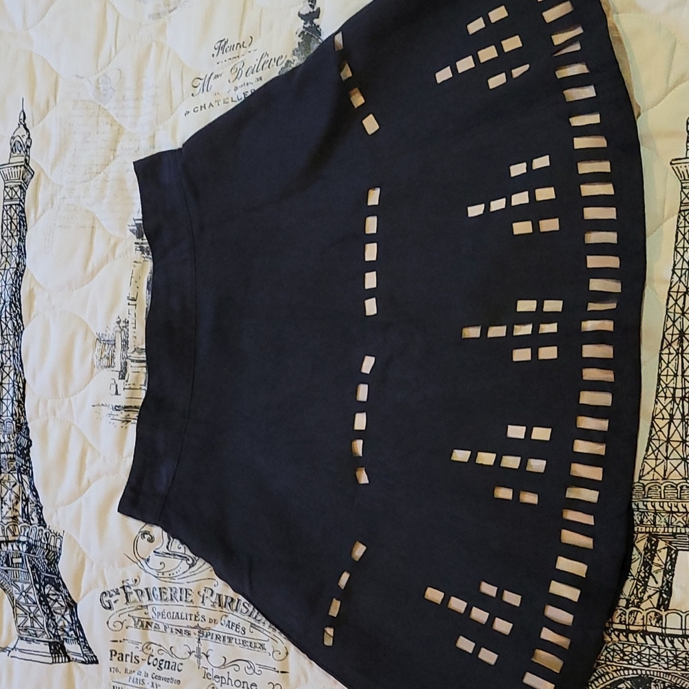 Black and nude cut out skirt